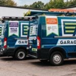 branded giving back a1 door company trucks - community logo